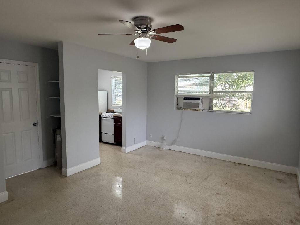 Photo of 1150 W Blue Heron Blvd #4, Riviera Beach, FL 33404 (MLS # R11148652)