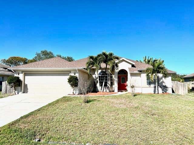 Photo of 713 SW Andrew Road, Port Saint Lucie, FL 34953 (MLS # R10766690)