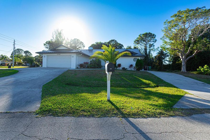 Beautifully updated single-family home located in the heart of Port Saint Lucie with no HOA! This inviting residence features 3 bedrooms, 2 full bathrooms, and a 2-car garage, all set on a desirable corner lot. Enjoy an open-concept layout filled with natural light, perfect for everyday living and entertaining. Step outside to your private screened-in pool, ideal for relaxing or hosting guests year-round. The home boasts a brand-new metal roof, new gas line connection, and a new irrigation system, offering peace of mind and efficiency. Freshly painted inside and out, the property also includes a storage shed and a generous driveway with plenty of space for multiple vehicles.
