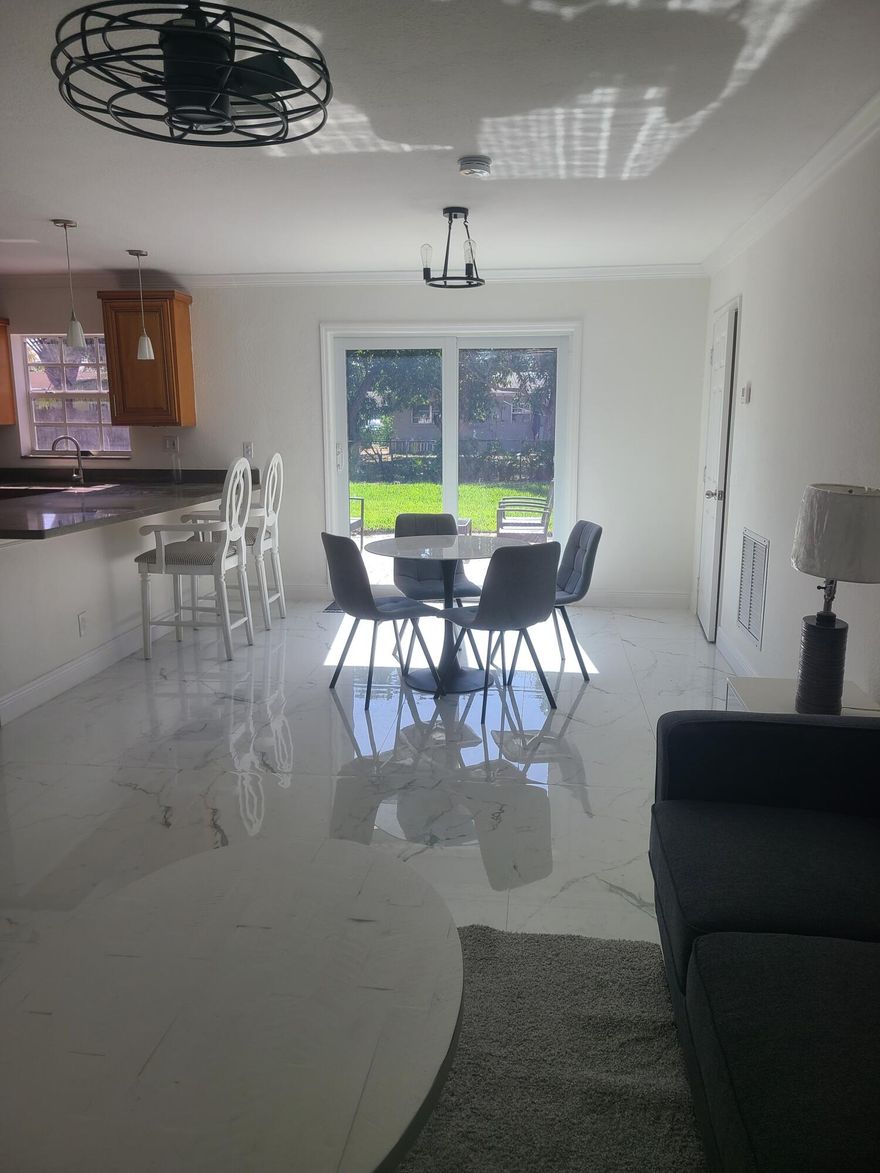 Renovated home in desirable Seacrest Park. NO HOA. Centrally located, close to downtown Atlantic Ave, the beach, shops,restaurants and entertainment. Oversized, fenced yard with plenty of room for expansion , pool, or your own tropical oasis. Newer roof, AC, tankless water heater, porcelain tile throughout.House is move in ready, furniture negotiable.