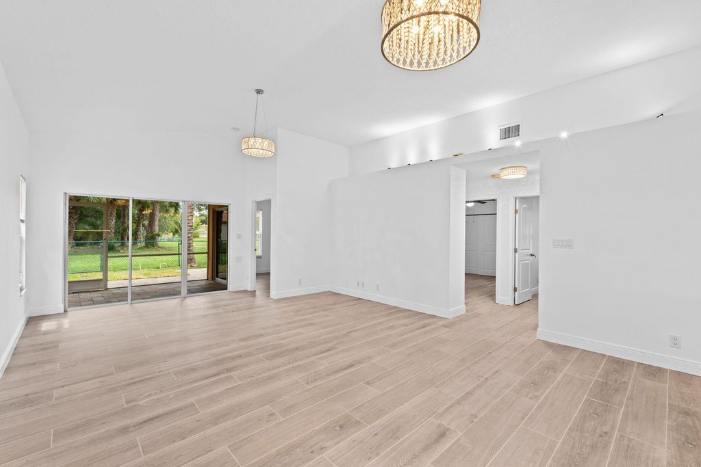 Photo of 5122 Elpine Way, Riviera Beach, FL 33418 (MLS # B26025746)