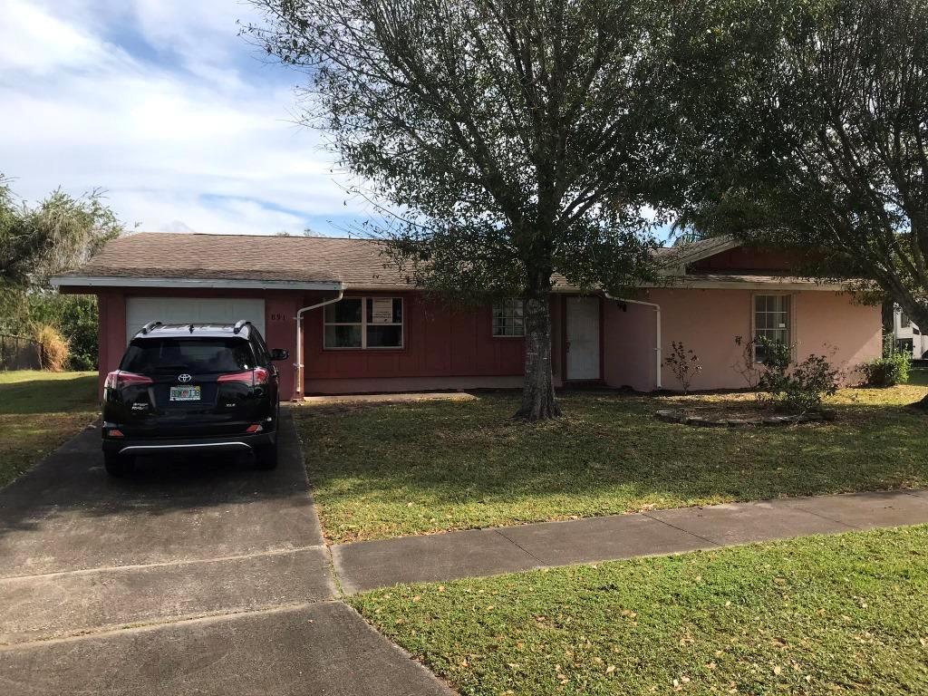 Photo of 891 SW Goodrich Street, Port Saint Lucie, FL 34983 (MLS # R10687729)
