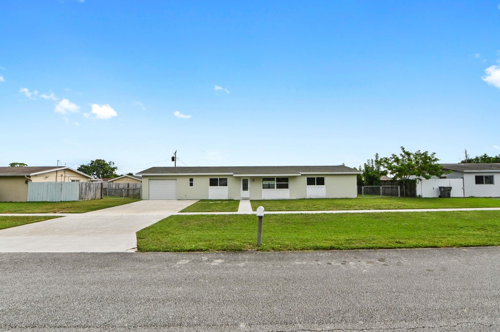 Photo of 1580 Roy Drive, West Palm Beach, FL 33415 (MLS # B26091392)
