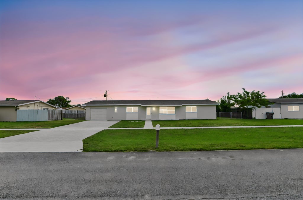 Photo of 1580 Roy Drive, West Palm Beach, FL 33415 (MLS # B26091392)