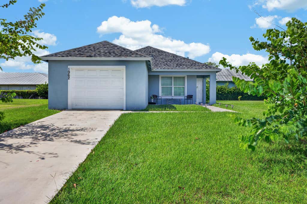 Photo of 1962 SE GENA Road, Port Saint Lucie, FL 34952 (MLS # B26058814)