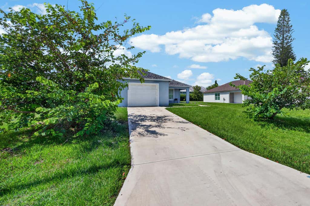 Photo of 1962 SE GENA Road, Port Saint Lucie, FL 34952 (MLS # B26058814)