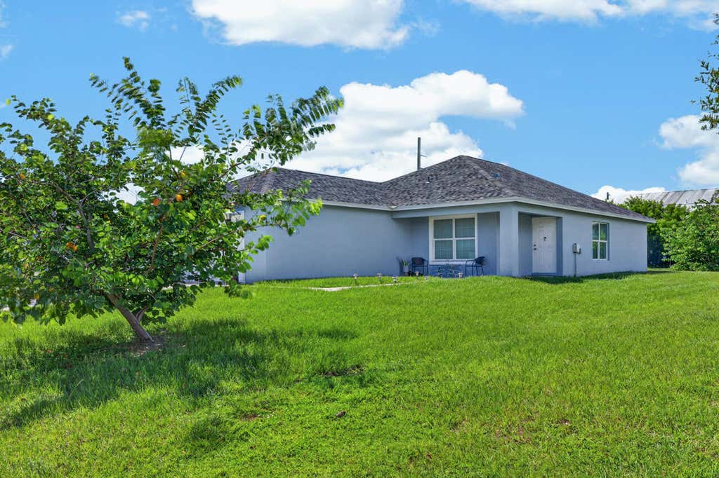 Photo of 1962 SE GENA Road, Port Saint Lucie, FL 34952 (MLS # B26058814)