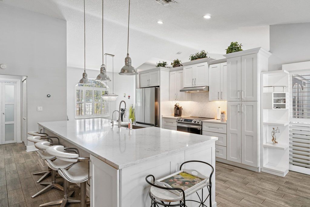 Photo of 13033 Randolph Siding Road N, Jupiter, FL 33478 (MLS # R11166837)