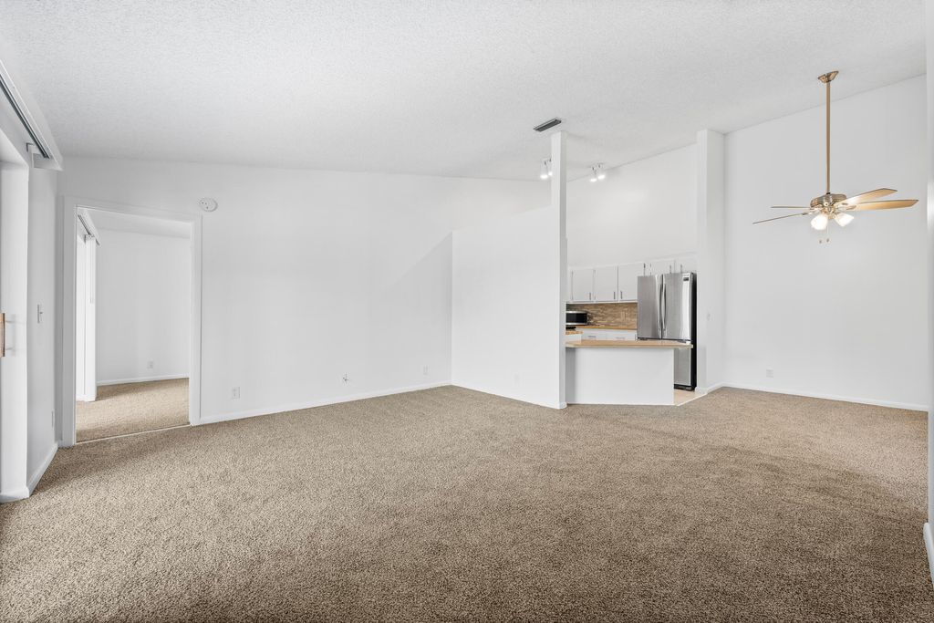 Photo of 6560 Chasewood Drive #E, Jupiter, FL 33458 (MLS # R11059701)