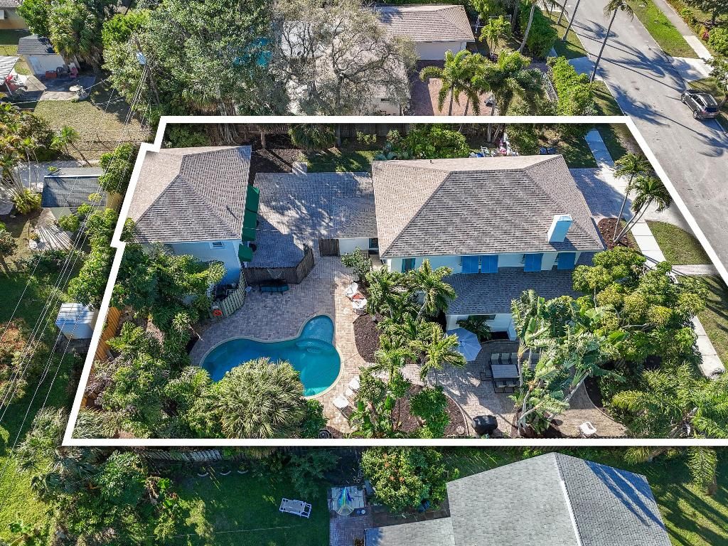 Photo of 250 Foresteria Drive, Lake Park, FL 33403 (MLS # R11142531)