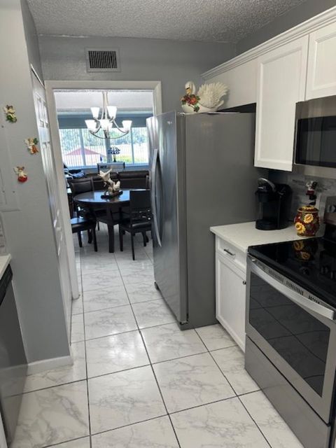 Tiny photo for 6768 N 10th Ave Avenue N #210, Lake Worth, FL 33467 (MLS # B26009756)