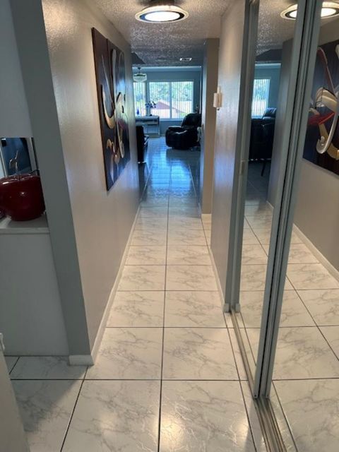 Photo of 6768 N 10th Ave Avenue N #210, Lake Worth, FL 33467 (MLS # B26009756)
