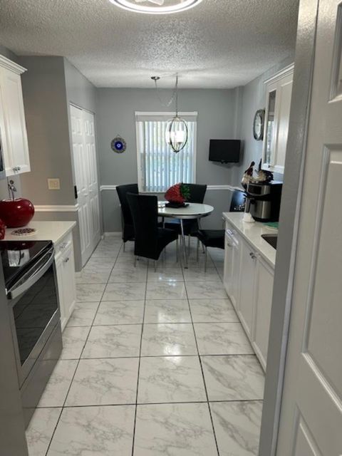 Tiny photo for 6768 N 10th Ave Avenue N #210, Lake Worth, FL 33467 (MLS # B26009756)