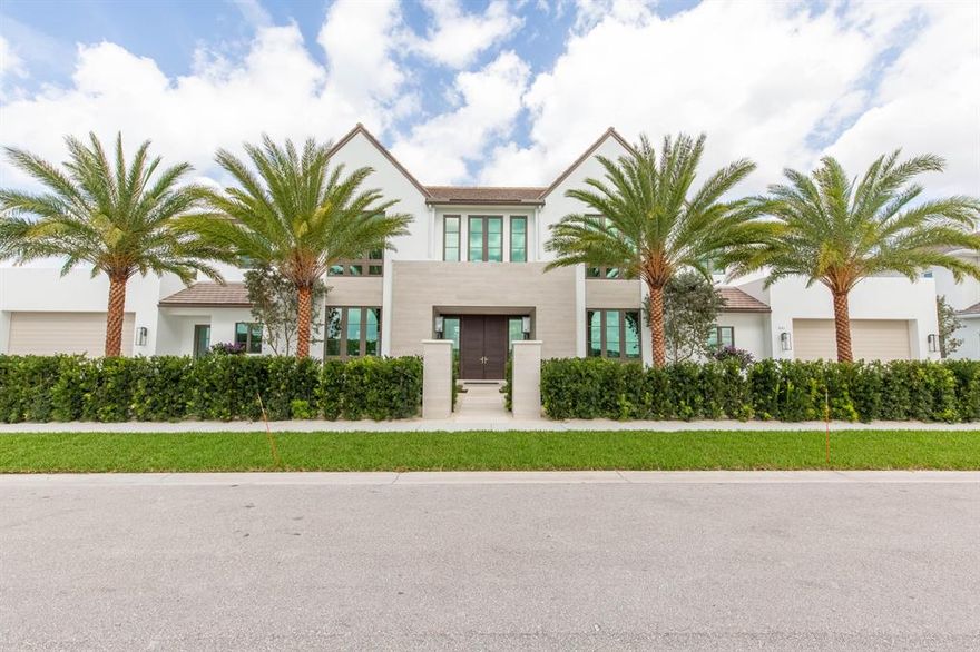 This stunning new custom build is situated in the heart of Palm Beach Polo on a highly-sought after waterfront lot. Enjoy captivating views of the 11th hole on the Cypress course and 92-acre natural preserve from the luxurious pool and covered lanai. Inside, the one-of-a-kind modern design boasts over 7,400 square feet of living space with 6 bedrooms and 7 and a half bathrooms. The Tudor inspired roofline and floor-to-ceiling windows create dramatic spaces, filled with tons of natural light. The main level is complete with beautifully appointed master suite, a guest suite, a library, and two wine rooms adjacent to the formal dining room. Upstairs you are greeted with even more breathtaking views from the loft, 3 additional guest bedrooms and a VIP suite with a large balcony.