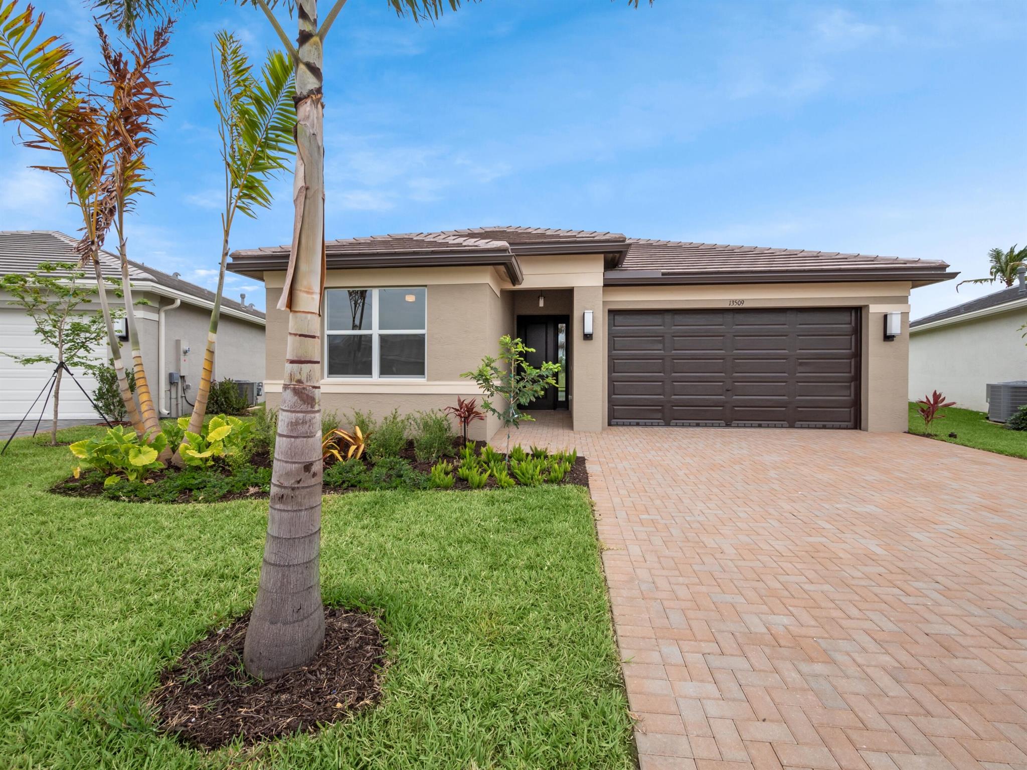 Experience resort-style living every day in Valencia Grove at Riverland, a premier 55+ active adult community with No CDD Fees. This beautifully upgraded Sandpiper model offers a bright, open-concept layout and sits on a generously sized lot, ideal for a future pool, fence, screen enclosure, or all of the above (survey available).Inside, enjoy luxury vinyl plank flooring throughout, full impact windows and doors, and a kitchen with upgraded appliances that flows seamlessly into the great room. Large sliding doors lead to an oversized screened lanai with an extended paver patio, perfect for entertaining or relaxing.Flooded with natural light and thoughtfully upgraded throughout. This move-in ready home combines comfort and style.