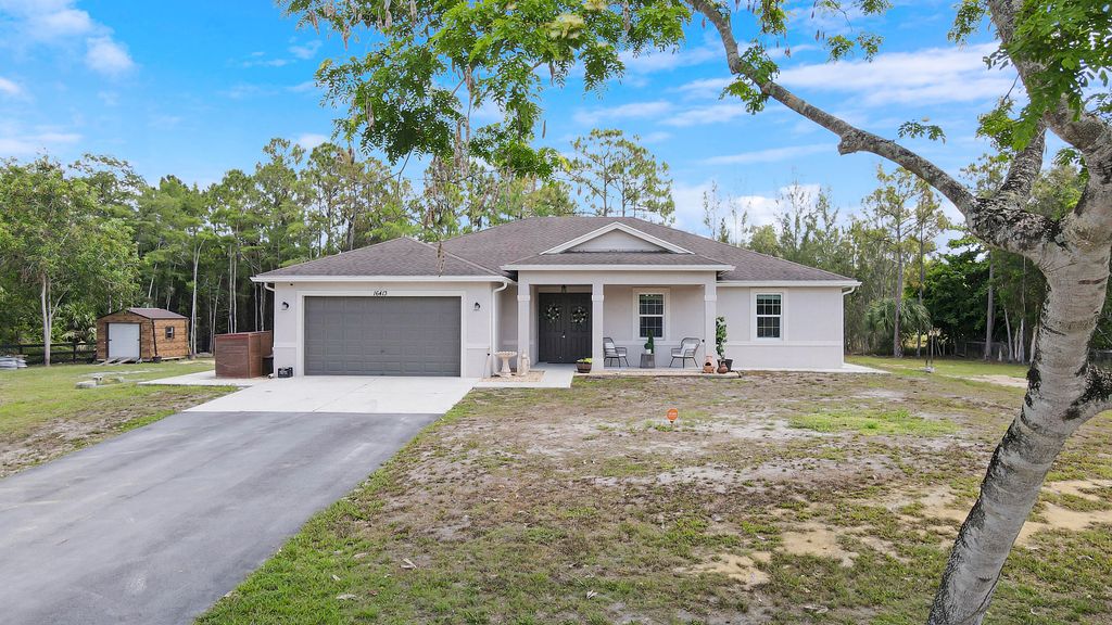 Photo of 16413 64th Place N, The Acreage, FL 33470 (MLS # R10988506)
