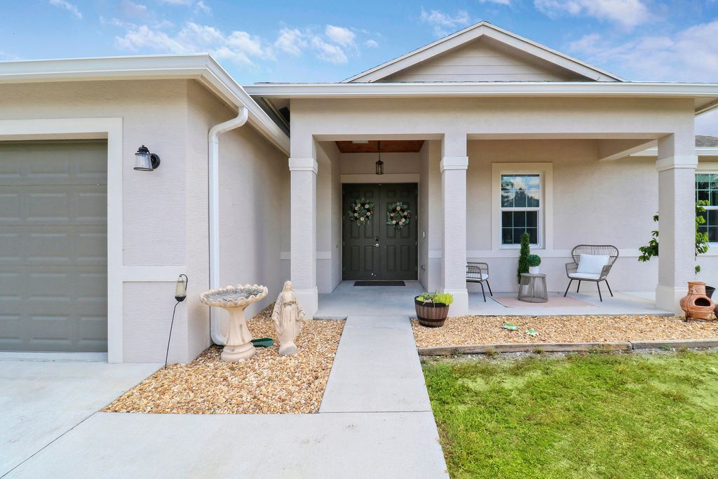 Photo of 16413 64th Place N, The Acreage, FL 33470 (MLS # R10988506)