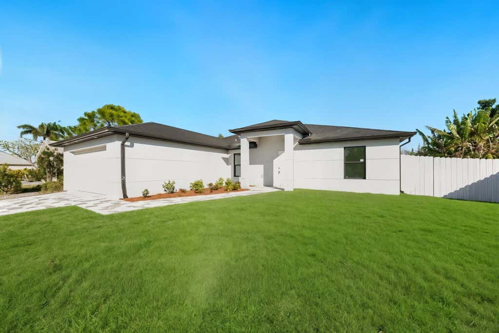 Photo of 1213 NW 22nd Place, Cape Coral, FL 33993 (MLS # R11149470)