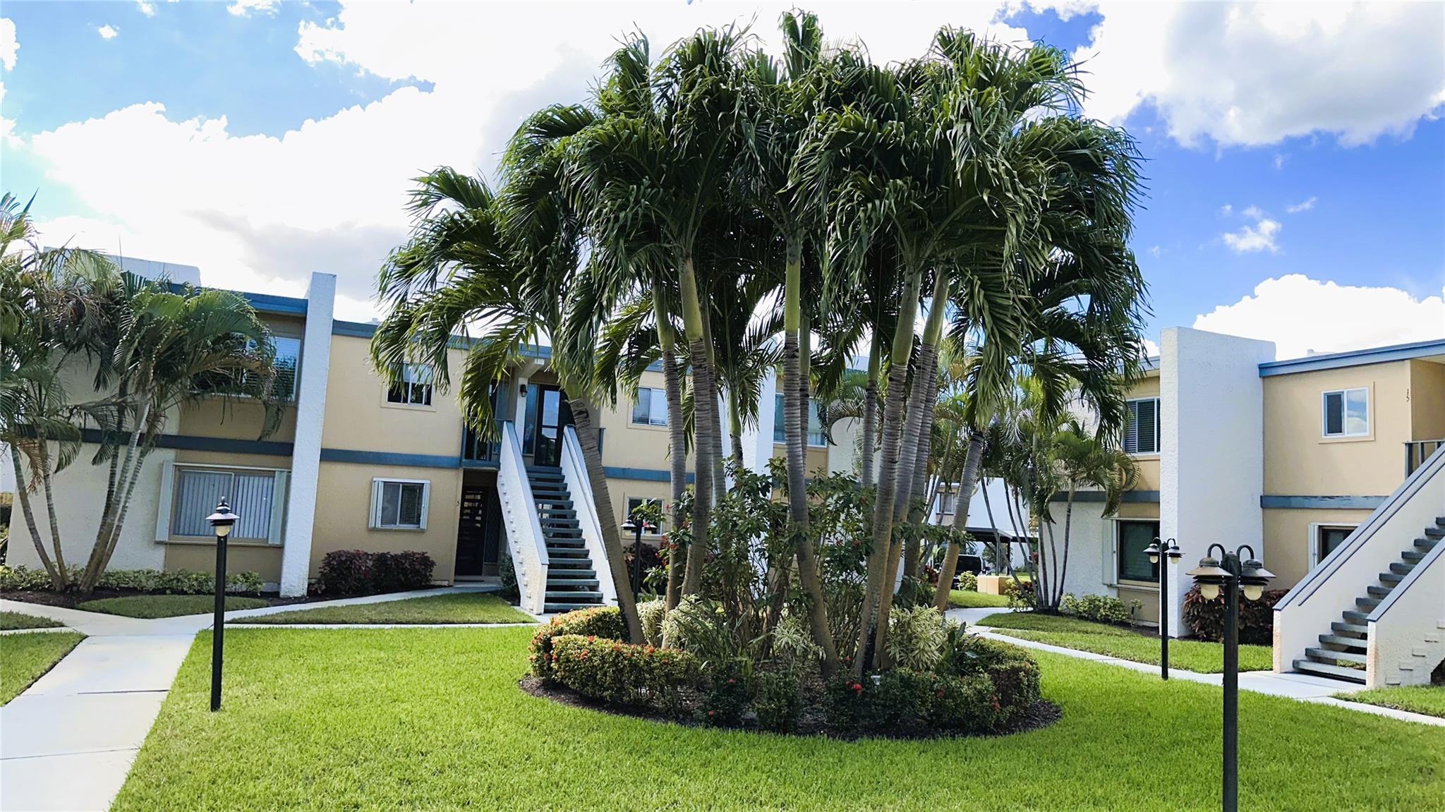 Property is now tenant occupied until the end of the year. PRICE REDUCED plus NEW floors & NEW paint, A/C 2021. Private wrap around patio, 1st floor rarely available w BONUS feature, BBQ area for entertaining, beach chairs & more. Private gate entry to your carport allowing easy access for your dog, bikes & groceries. 2 primary suites w walk in closets. Enclosed Lanai/Florida room. Investor & pet friendly, 3 pools, 3 tennis courts, pickle ball, shuffleboard, billiards, clubhouse, sauna, dock space up to 21 ft upon availability, direct ocean access, Boat/RV storage, on site laundry, secured storage area. Also available for rent or lease option, first and security only w qualified tenant. Walk to your local restaurants & shops. Bike & walking trail to all amenities. 55+ & Low HOA