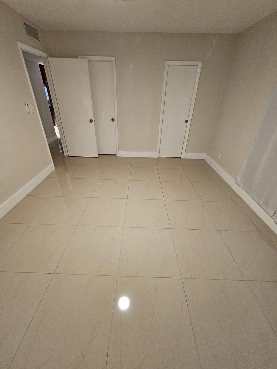 PRICE TO SELL! COMPLETELY REMODELED WITH A CONTEMPORARY DESIGN AND HIGH-END LUXURY FINISHES, THIS MOVE-IN READY, VERY SPACIOUS AND BRIGHT 2/2 FIRST-FLOOR CORNER UNIT FEATURES A BRAND-NEW LIGHTING SYSTEM THROUGHOUT. FULL-SIZE WASHER AND DRYER INSIDE THE UNIT. LUXURY 24x24 TILE FLOORING THROUGHOUT THE ENTIRE APARTMENT. STUNNING KITCHEN FEATURING GRANITE COUNTERTOPS, A DOUBLE SINK AND STAINLESS STEEL APPLIANCES. HOA INCLUDES WATER AND POOL. NEWEST A/C (2019 INSIDE 2024 OUTSIDE) AND NEWEST WATER HEATER (2021). HURRICANE SHUTTERS ON ALL WINDOWS. TWO ASSIGNED PARKING SPACES PER UNIT. EXTRA STORAGE. ONE OF THE LARGEST CONDOS IN THE HEART OF CORAL SPRINGS. CONVENIENTLY LOCATED WITHIN WALKING DISTANCE TO SHOPPING CENTERS, RESTAURANTS, AND EASY ACCESS TO MAJOR HIGHWAYS.  MUST SEE!