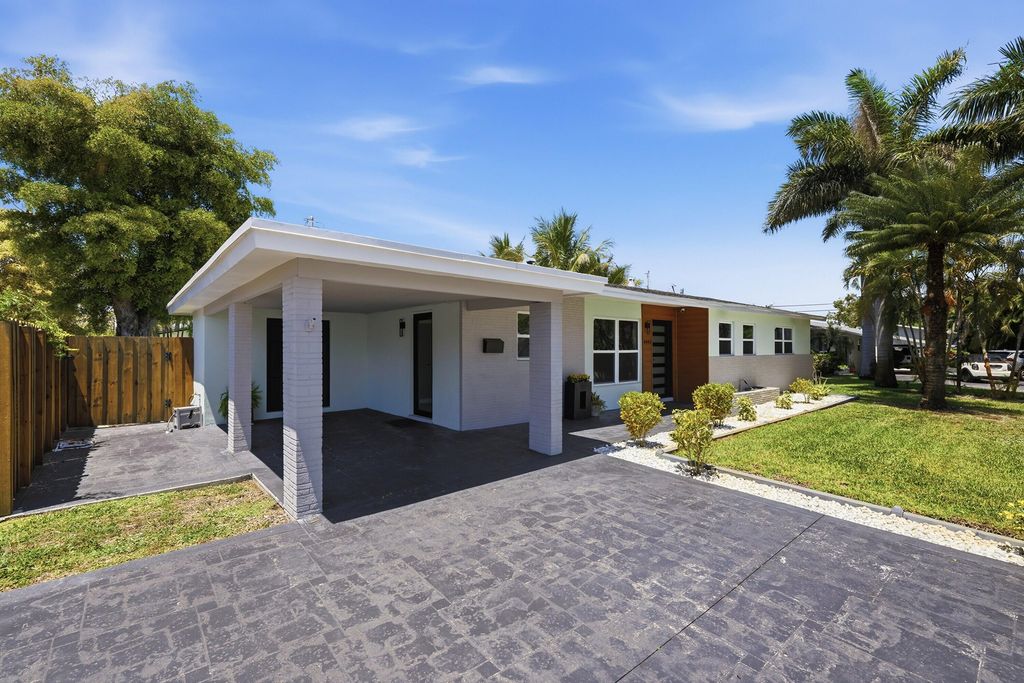 Photo of 4441 NE 15th Avenue, Oakland Park, FL 33334 (MLS # B26019281)