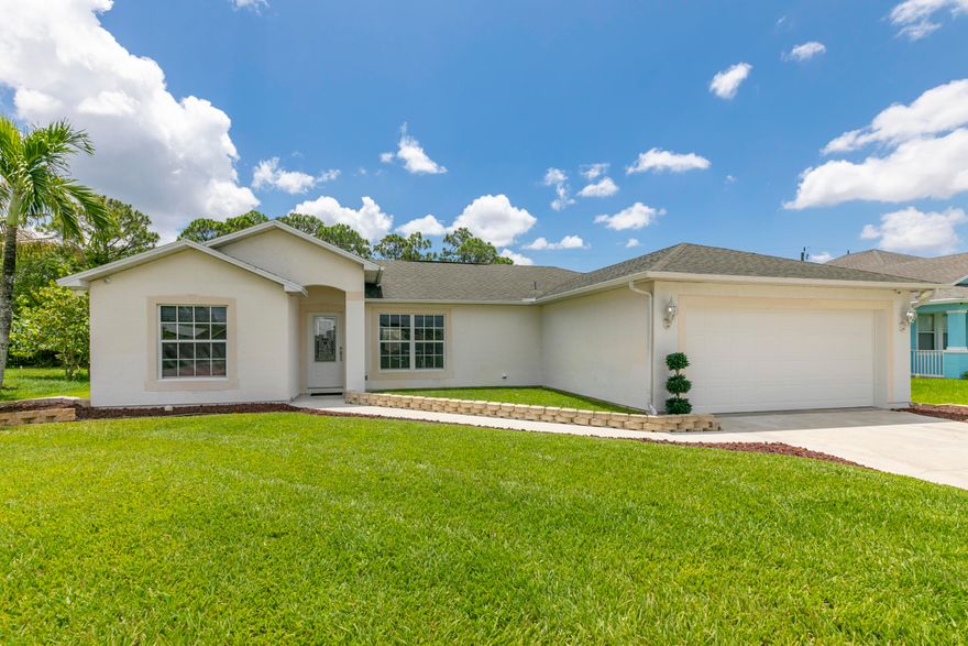 Meticulously maintained charming 3 bed/2 bath /2 car garage pool house. This move in ready home is perfectly manicured f/m the second you pull up to lush green grass and landscaping. Well lit w/ custom LED lights & cameras secured by Tuxedo's wifi touch screen system. The privacy landscaped back yard, not only boasts a screened in porch w/fabulous solar heated Roman style pool, has an 8 person jacuzzi! The interior is just as detailed as the exterior w/ granite counter tops complimented by granite floors, throughout the kitchen and bathrooms. The A/C was replaced in 2016, w/10-year warranty. Complete with a water softening system. If you are looking for the perfect  move in ready PSL pool home,  w/NO HOA to bring your pets, boats, RV's and other toys, you have found your home!