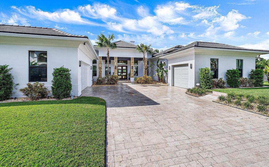 Welcome to this waterfront oasis with over 120 ft of deep water frontage, just one canal from the Intracoastal waterway. Built in 2017, this British West Indies Style home features 4 bedrooms & 4 baths, including a guest home. Step inside where you will be greeted by your majestic great room boasting 16' ft ceilings & sprawling waterfront views.  Just one minute to the intracoastal, this home is a boater's dream featuring a 14k lb covered boat lift & 2 docks. The location & shape of this 1/3 acre lot is at the widest part of the canal, allowing for a better turning radius & more water frontage making it a premium lot in the community! This home was custom built with only the finest of craftsmanship & attention to detail at every turn.