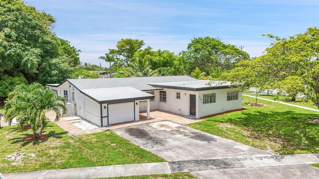 Photo of 301 NW 38th Street, Deerfield Beach, FL 33064 (MLS # F10514213)