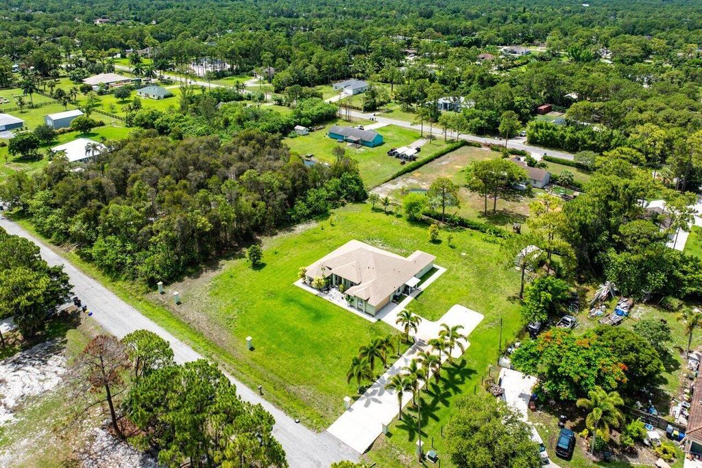 Photo of 16932 87th Lane N, The Acreage, FL 33470 (MLS # R11101400)