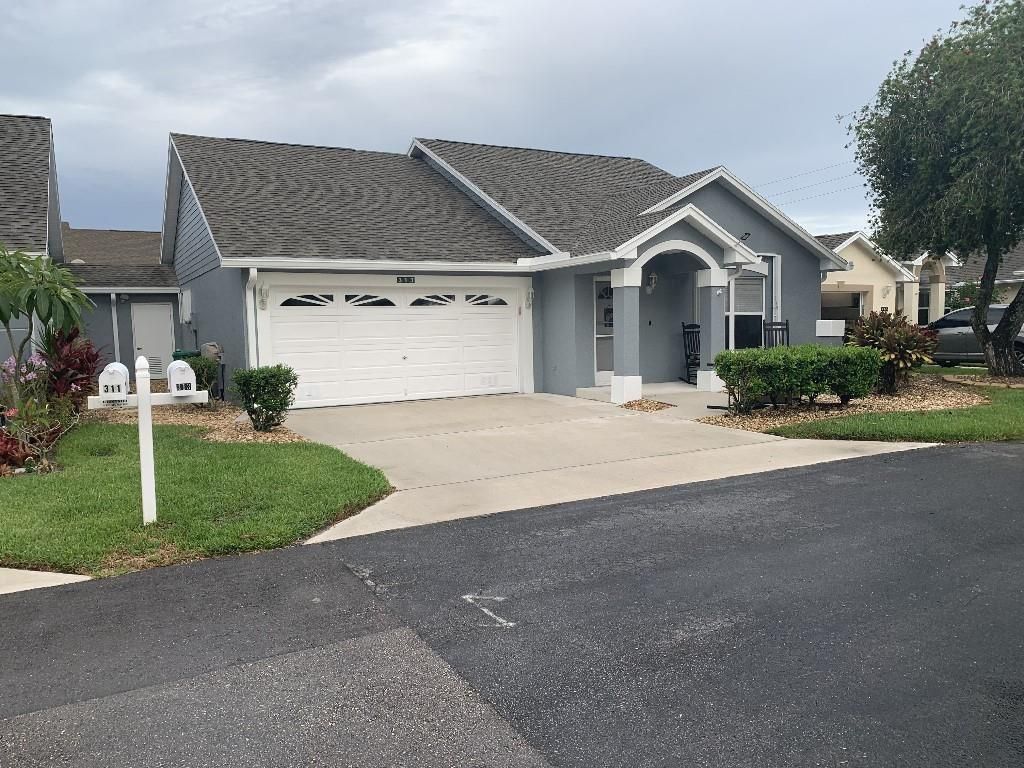 Photo of 313 NW Tuscany Lane, Port Saint Lucie, FL 34986 (MLS # R10731814)