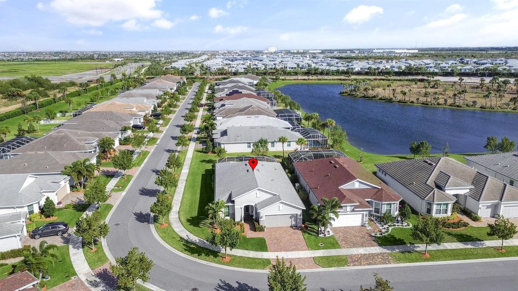 Photo of 12695 SW Cattleya Lane, Port Saint Lucie, FL 34987 (MLS # R10959922)