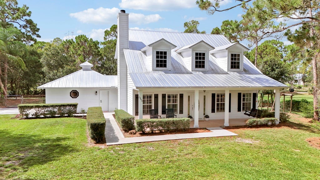 Photo of 10635 Pine Needle Drive, Fort Pierce, FL 34945 (MLS # B26057391)