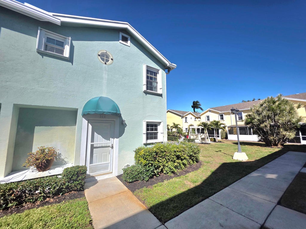Photo of 311 Waterside Drive, Hypoluxo, FL 33462 (MLS # B26091979)