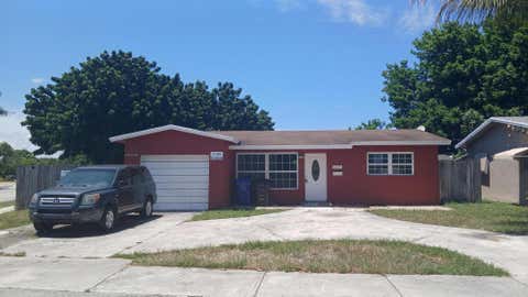 Photo of 6231 SW 9th Place, North Lauderdale, FL 33068 (MLS # B26046648)