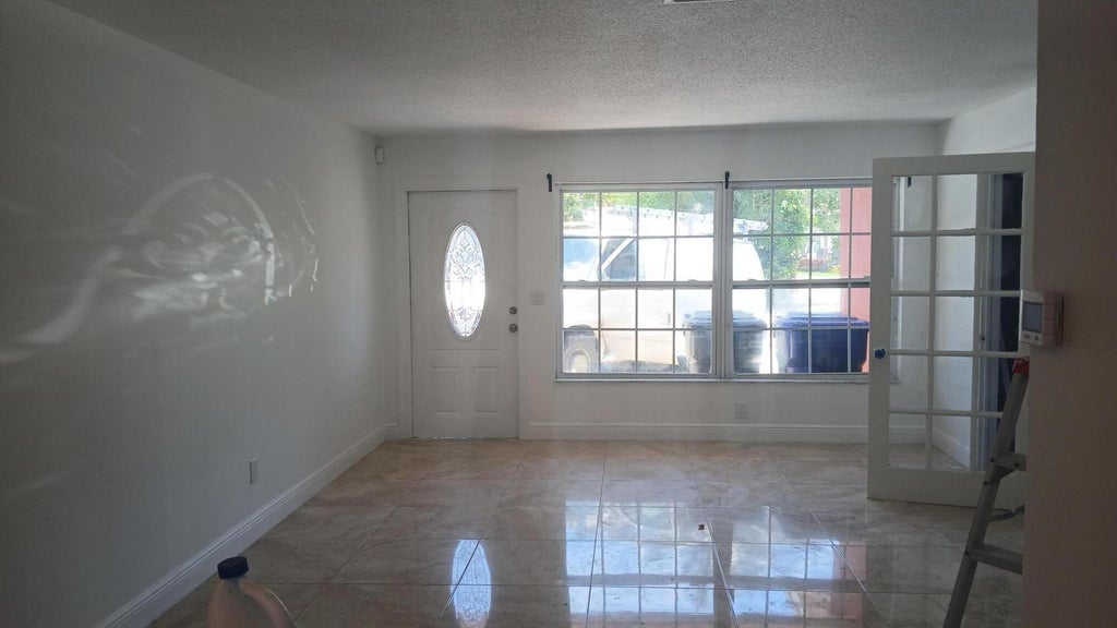 Photo of 6231 SW 9th Place, North Lauderdale, FL 33068 (MLS # B26046648)
