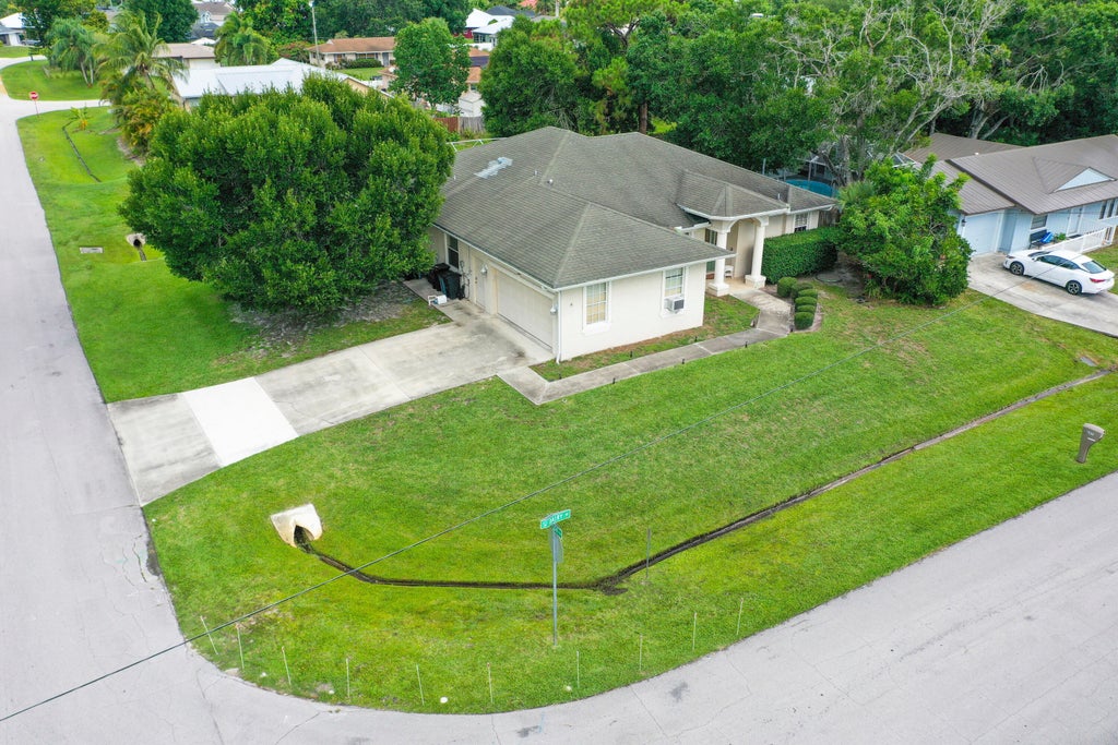 Photo of 697 SW Dairy Road, Port Saint Lucie, FL 34953 (MLS # R11094775)