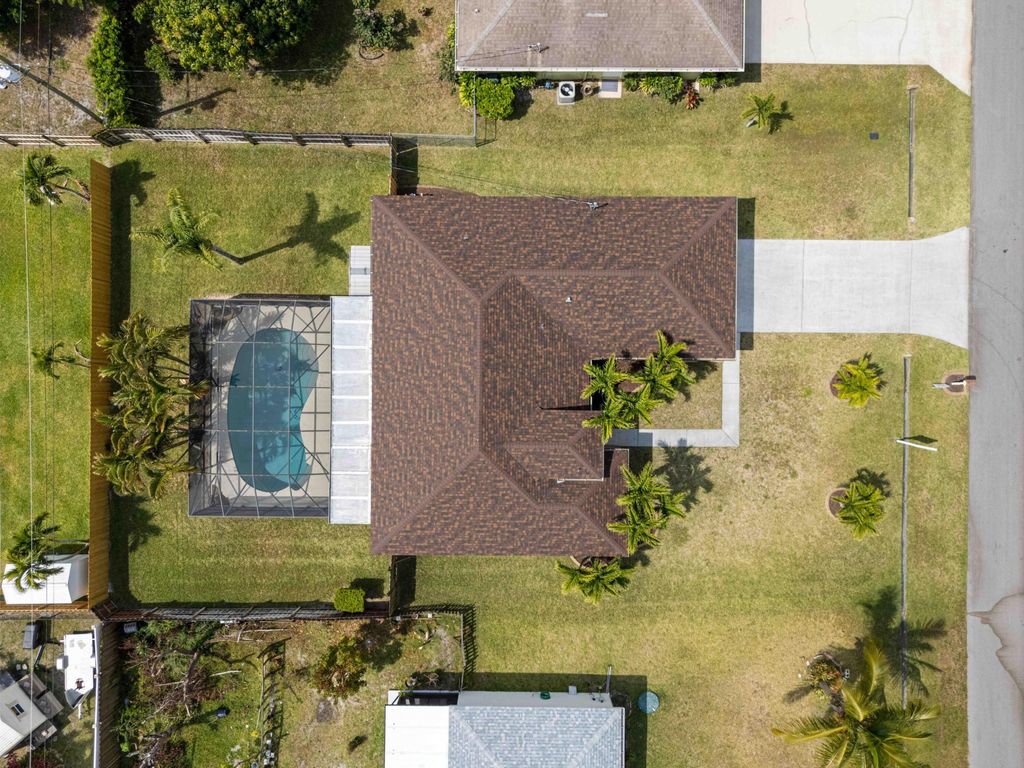 Photo of 1350 SW Wampler Avenue, Port Saint Lucie, FL 34953 (MLS # R11046626)