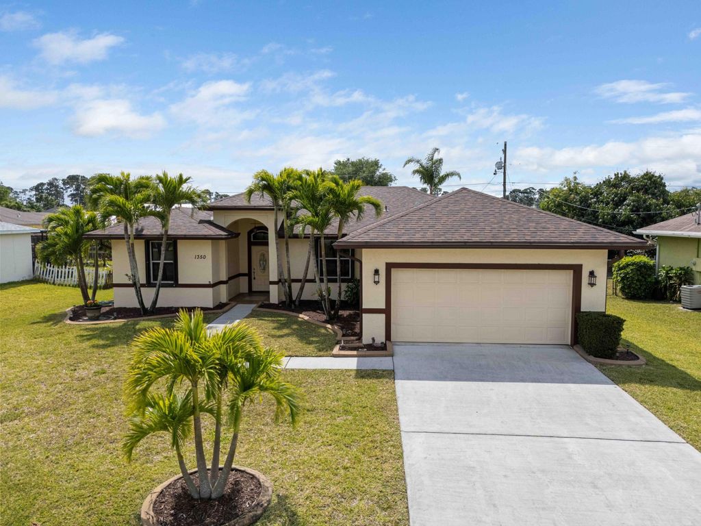 Photo of 1350 SW Wampler Avenue, Port Saint Lucie, FL 34953 (MLS # R11046626)