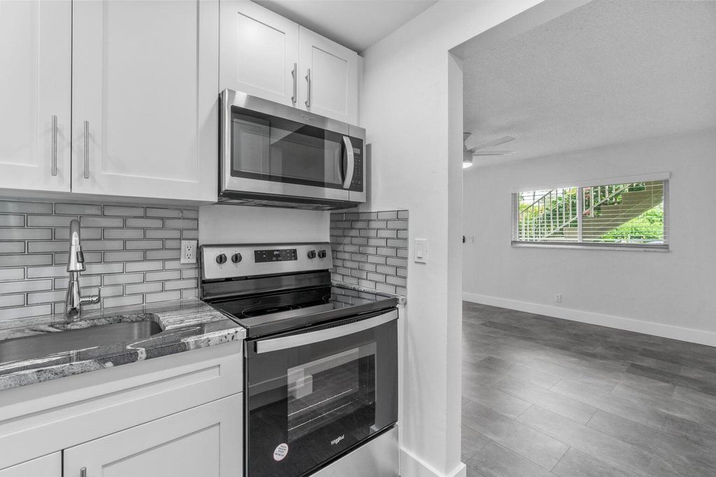 Photo of 1850 Palm Trail #102, Delray Beach, FL 33483 (MLS # R10985168)