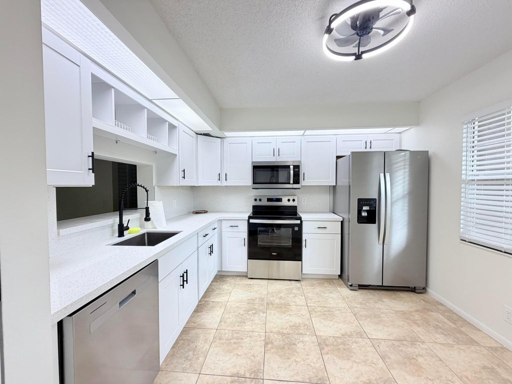 Photo of 1110 SW 125th Avenue #208M, Pembroke Pines, FL 33027 (MLS # B26088120)