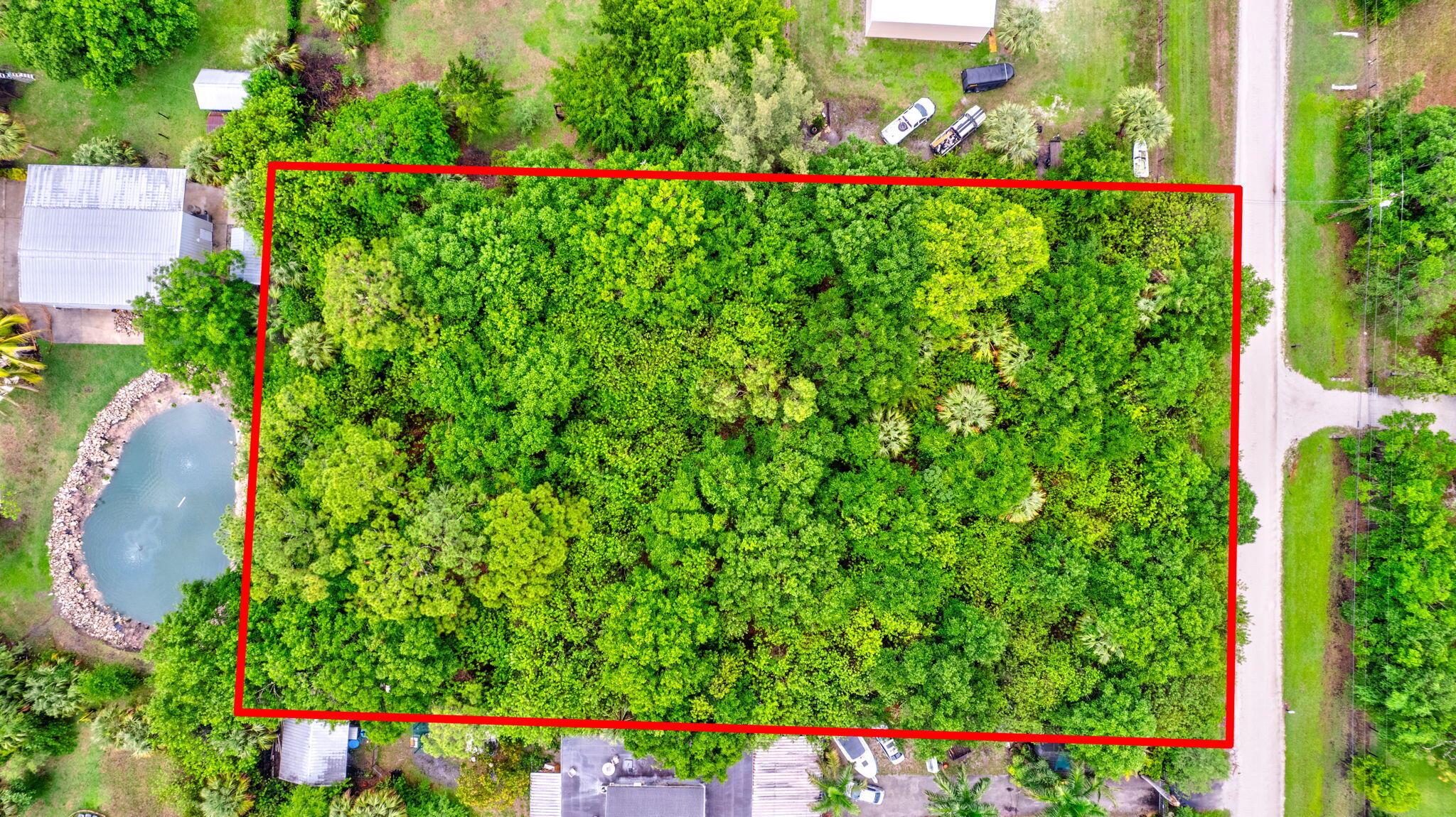 COME SEE THIS VACANT LOT TUCKED AWAY IN QUIET JUPITER FARMS FLORIDA. NO HOA WHICH GIVES YOU THE OPPORTUNITY TO BUILD YOUR DREAM HOME WITH ROOM FOR A BOAT, RV OR SMALL BARN! CLOSE TO I-95 AND TURNPIKE. LOT NEEDS TO BE CLEARED AND FILLED