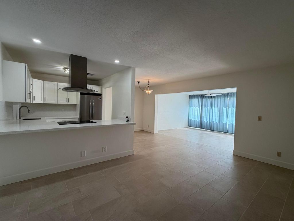 Photo of 5800 Fernley Drive W #3, West Palm Beach, FL 33415 (MLS # B26016490)