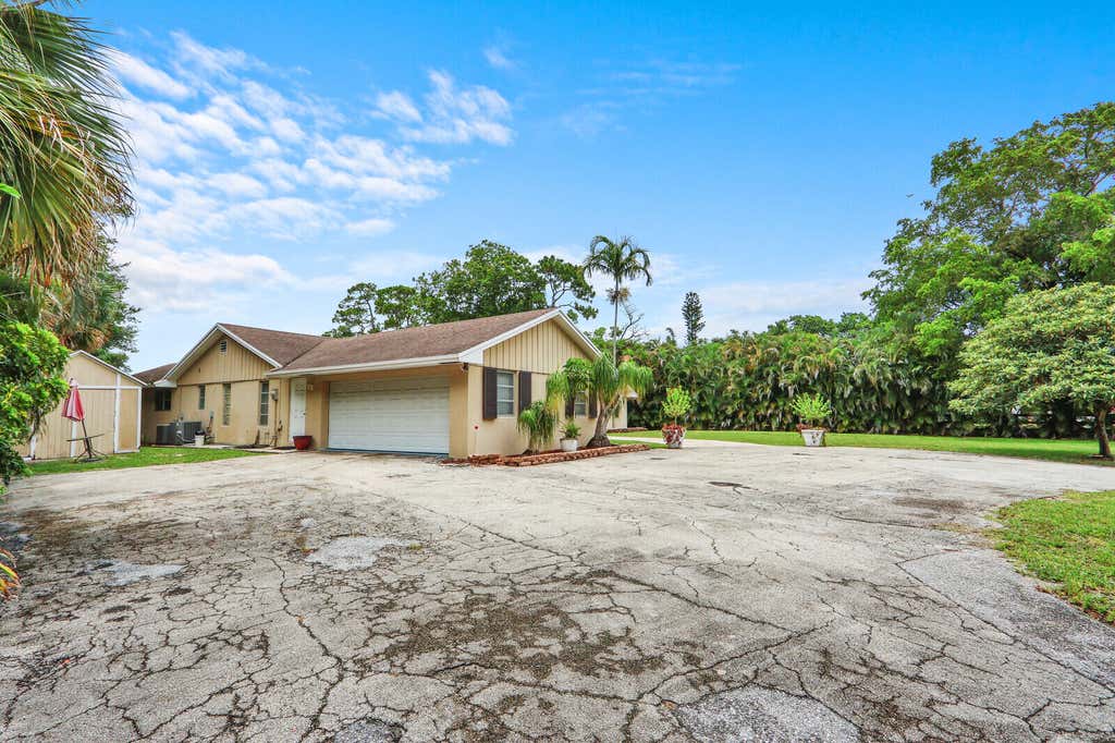 Photo of 4529 Square Lake Drive, Palm Beach Gardens, FL 33418 (MLS # B26038641)