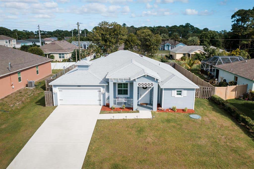 Photo of 1681 SW Buttercup Avenue, Port Saint Lucie, FL 34953 (MLS # R10779007)