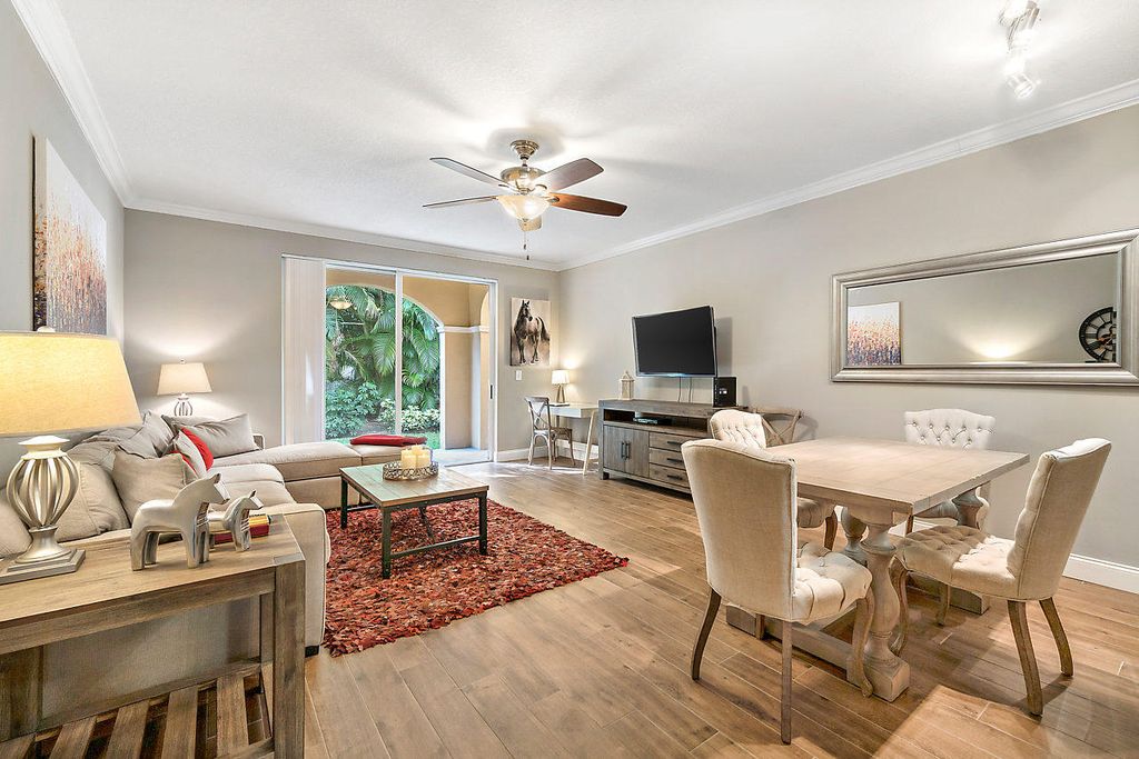 Photo of 11765 Saint Andrews Place #105, Wellington, FL 33414 (MLS # R11134392)