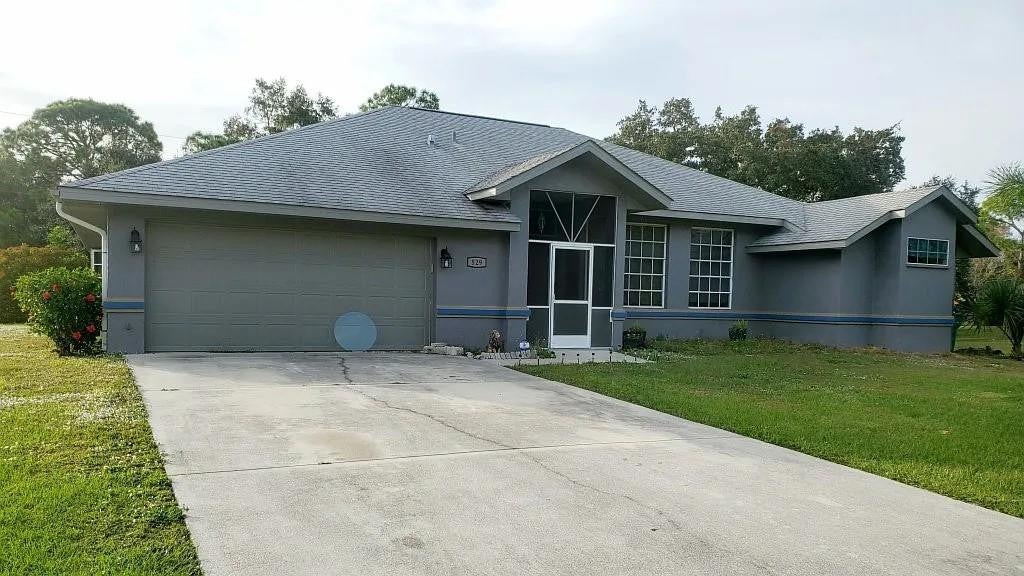 Photo of 529 Guild Street, Port Charlotte, FL 33954 (MLS # B26023810)