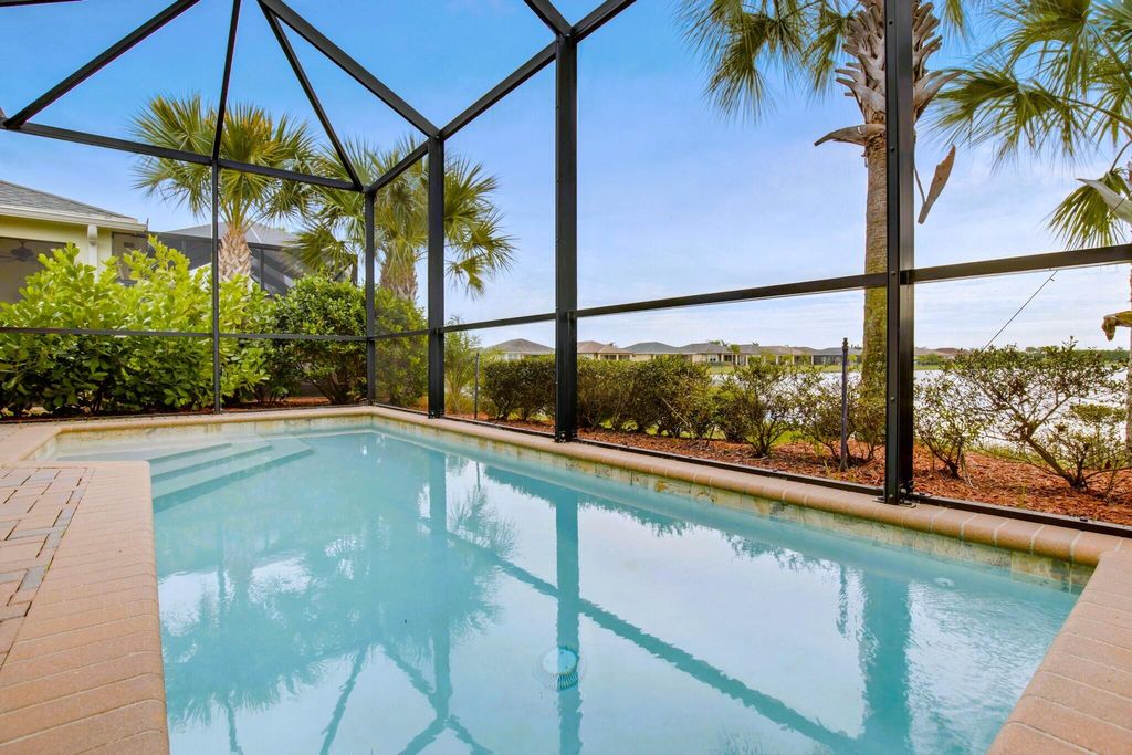 Photo of 11458 SW Lake Park Drive, Port Saint Lucie, FL 34987 (MLS # R10939767)
