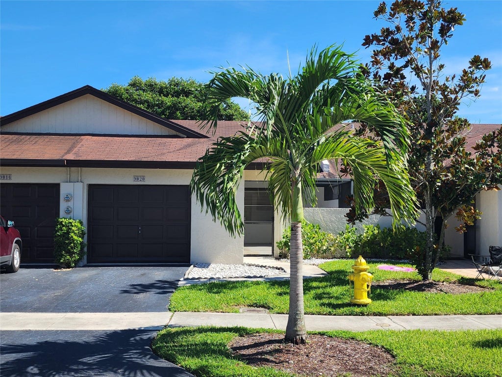 Photo of 9020 NW 60TH Street, Tamarac, FL 33321 (MLS # B26060803)