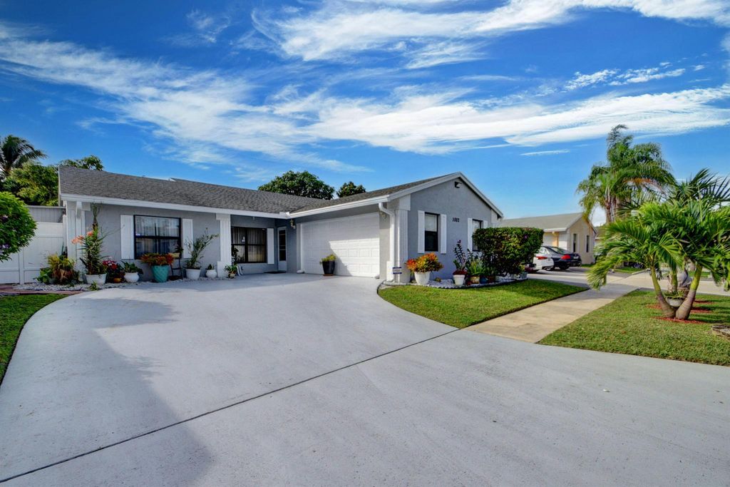 Photo of 5882 Lincoln Circle W, Greenacres, FL 33463 (MLS # R11136104)