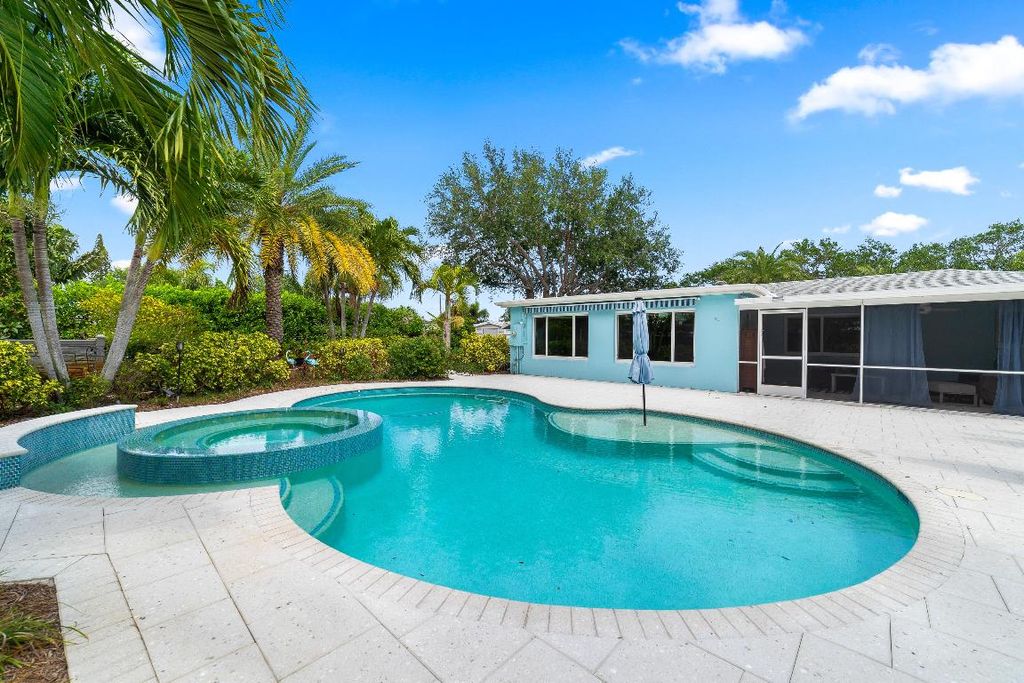 Photo of 830 Seminole Boulevard, Lake Park, FL 33403 (MLS # R11077616)